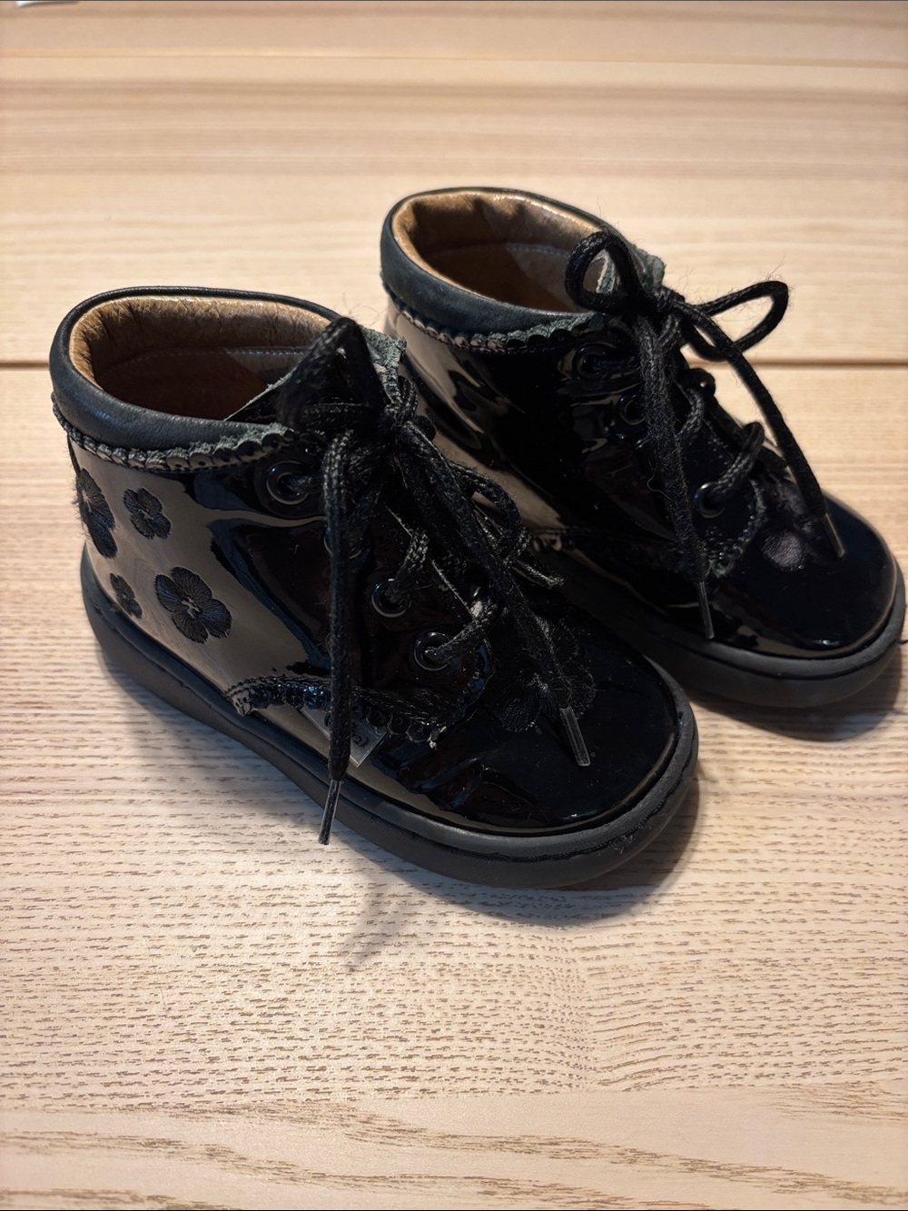 Patent Lace-Up Kids Ankle Boots in Black with Floral Detail
All leather
